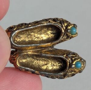 Antique ballet slippers gold charm with turquoise detail, highly detailed